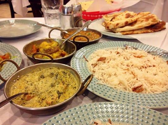 We got the vegetarian dinner for two: vegetable samosas, papadam, saag paneer, aloo gobi, dal, naan and rice pudding.