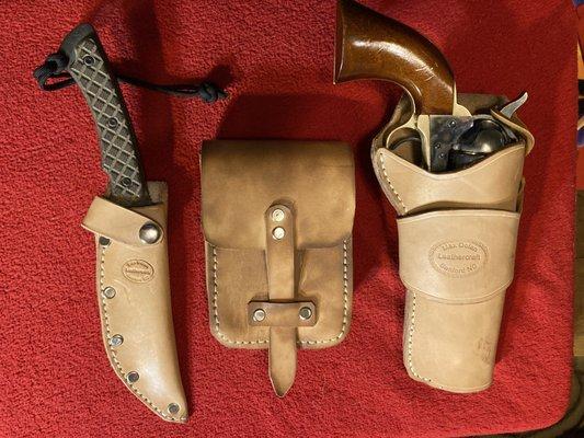 Leather set for a friend with a .45 Colt clone.  He didn't want a cartridge belt, but a case that would carry 50 .cartridges.