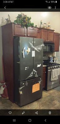 This is how ABC Warehouse left our new fridge. They did not hook up the water, remove plastic, adjust doors or level the fridge..