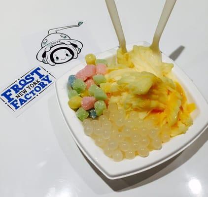 Peach shaved iced with yogurt boba and rainbow mochi with mango drizzle!