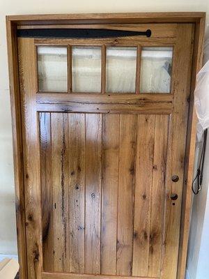 A hand crafted door made from reclaimed white oak.