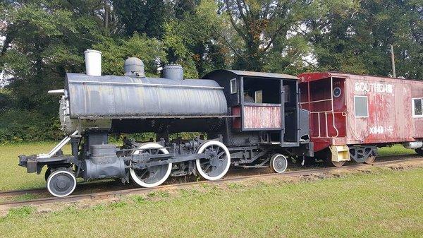 Train that sits on the rear of the property of the East Point Historical Society