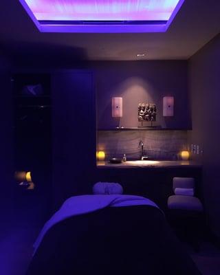 Private massage room with mood lighting