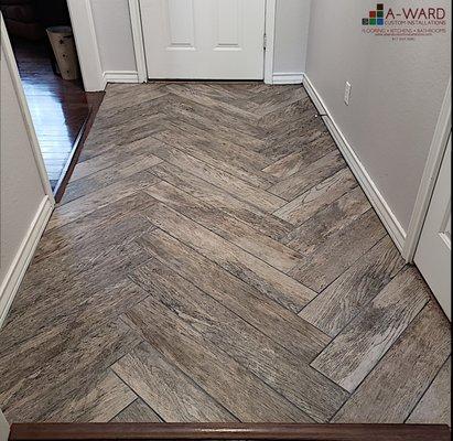 Wood-look tile foyer installation.