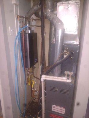 Installed New Tankless Water Heater & Serviced HVAC