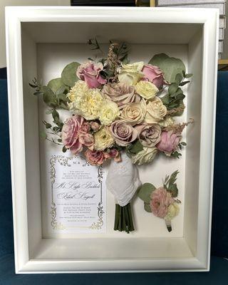 Preserved wedding bouquet with boutonniere, invitation, and handkerchief.