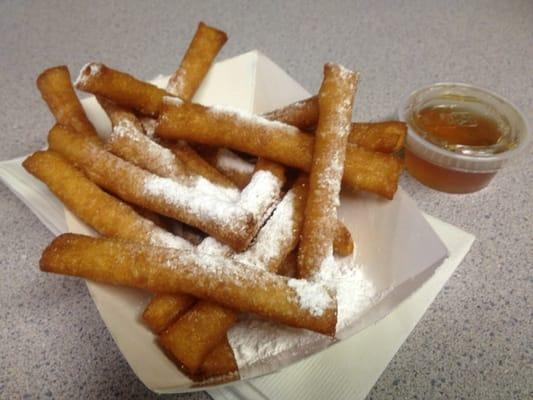 Wow! Funnel cake fries, served with powdered sugar and real local maple syrup!