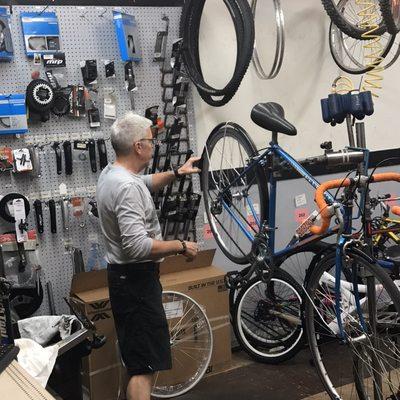 Store Owner and Lead Mechanic, Dave Meadows, works on a repair.