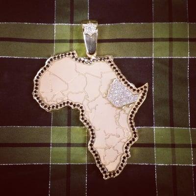 Custom Africa pendant with Ethiopia highlighted. Black and white diamonds.