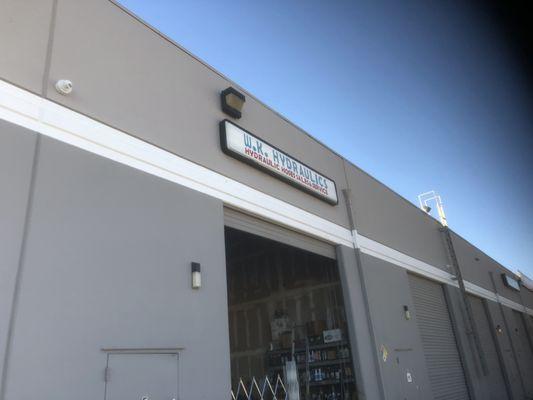 Security cameras installed on a warehouse overlooking the parking area