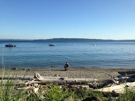 Hubby searching for sea glass.