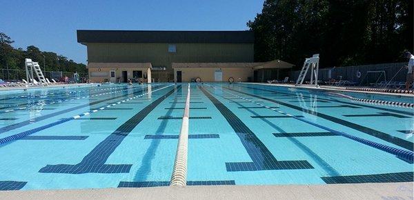 Our Olympic outdoor pool has full locker rooms, lounge chairs, umbrellas and concessions area. Open from sunrise to sunset May thru October.