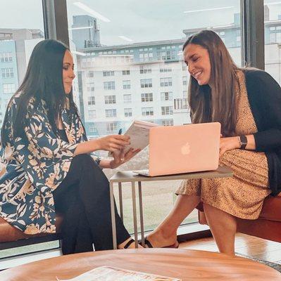 Working hard! MOD co-owner Jaclyn Poole and Dallas Market Director Natalia Tayem keeping the Dallas market running smoothly.