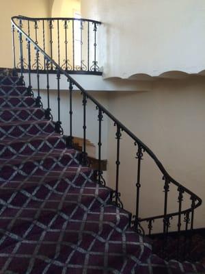 Beautiful staircase leading to the second floor from the main lobby.