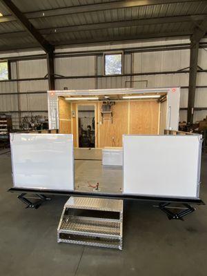 6x12 enclosed stage trailer with hand railing for retail vending.