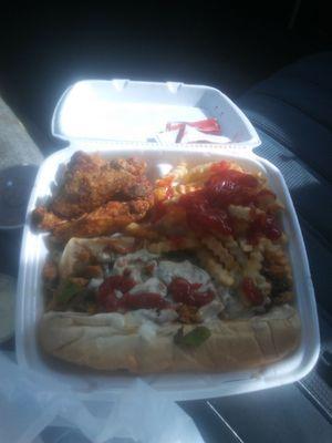 Chicken sub and garlic wings and fries