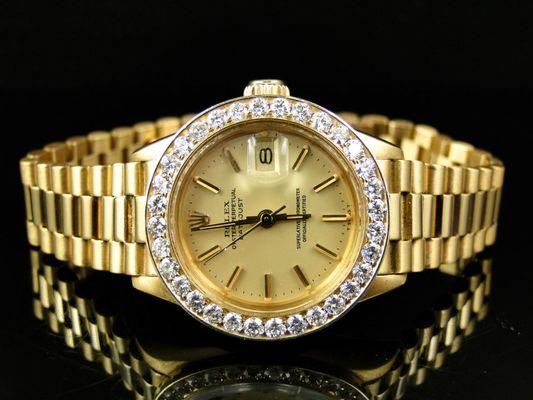 Ladies 18k Gold Rolex President watch with diamonds