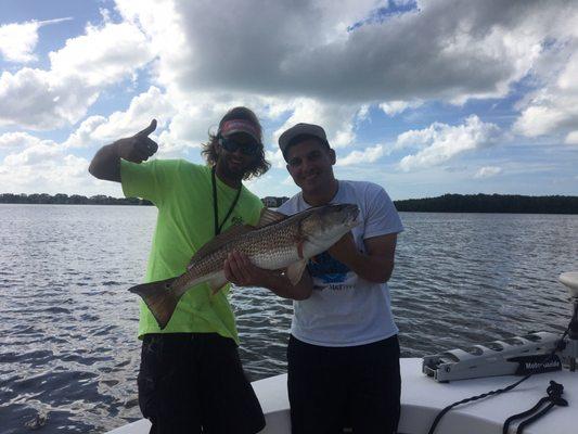 Captain Ben and myself with a stallion of a redfish!