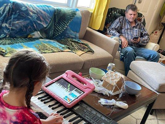 Uncle is visiting for Christmas, but Vee wants to play with the piano rather than participate in Christmas stuff