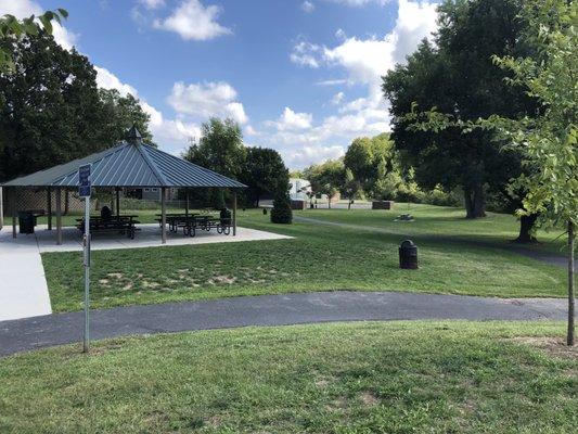 Picnic shelter, port-a-potties, and basketball court