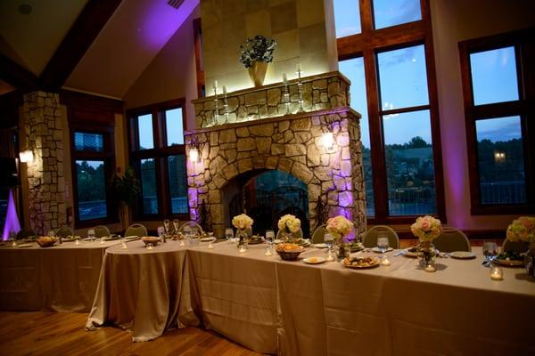 Here's the wedding party table, as it appeared in all my pics taken at the ceremony. The linens are wrinkled and look at the middle table!!