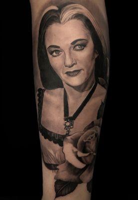 Black and Grey realism portrait of Lily Munster.