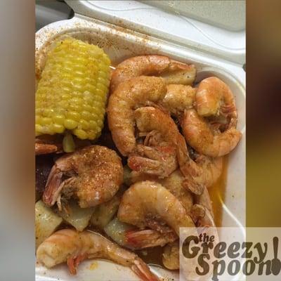 Steamed garlic butter shrimp with corn and potatoes