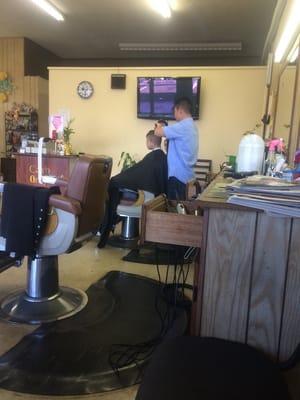 My baby getting his hair done! It's summer and it's hot! Time to chop it all off lol