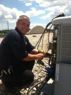 Kevin working on a rooftop unit