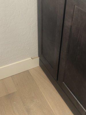 This cabinet was also mis measured so they botched out my brand new 5" baseboard so it could open - NIGHTMARE company