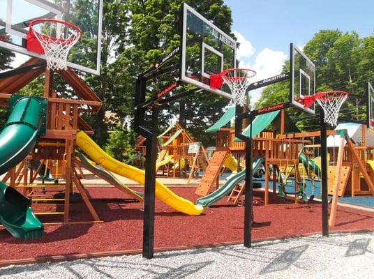 These Best in Backyards' displays feature Goalsetter basketball systems, Eastern Jungle Gym cedar swing sets and rubber playground mulch.