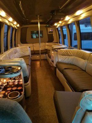 Interior 20 passenger party bus.