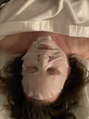 Add a rich collagen facial mask to your massage session