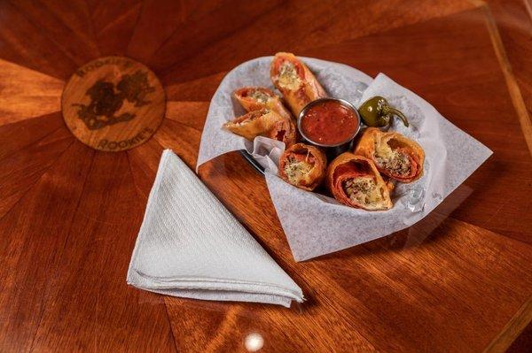 Hand rolled Italian sausage stuffed pizza rolls!