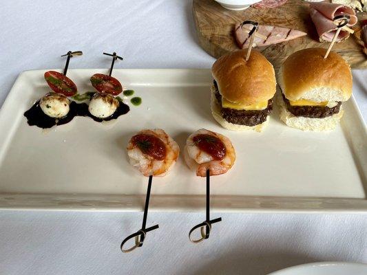 Hors d'oeuvres - caprese pick, shrimp cocktail, tiny cheeseburgers