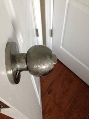 Just one of the glue covered door knobs that First Call Home Improvement left for me to clean up.