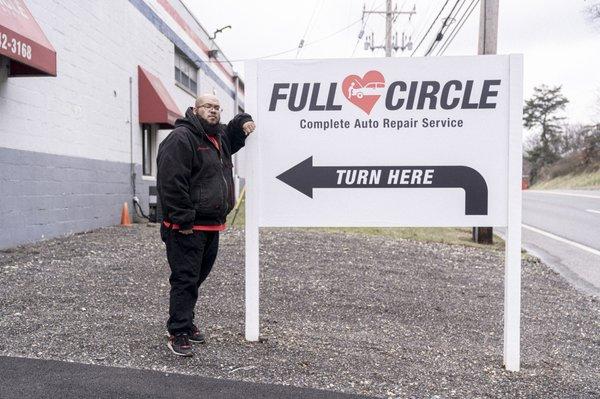 Turn when you see the big white sign!