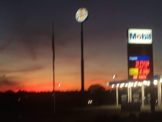 Saturday evening. 12/5/15. Pulling in as night falls. Mobil gas station and an adjoining Burger King here.