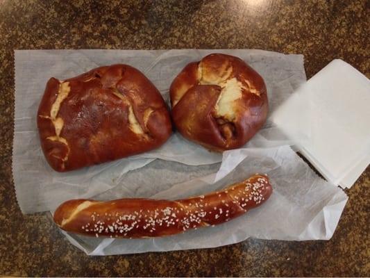 Pepperoni & cheese and Cheddar pretzel bombs with a pretzel stick