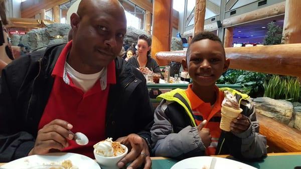 My husband and son enjoying dessert.