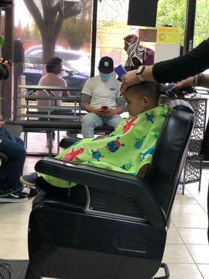 My oldest got his hair cut too. My 2.5 year old getting his haircut she did a great job!