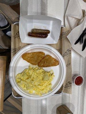 Scrambled eggs, hash browns and sausage