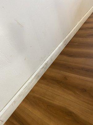 Filthy walls and baseboards