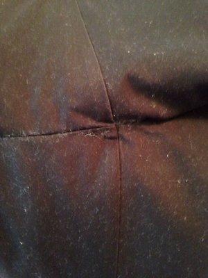 Lint/pet hair on black dress pants (photo of inseam)