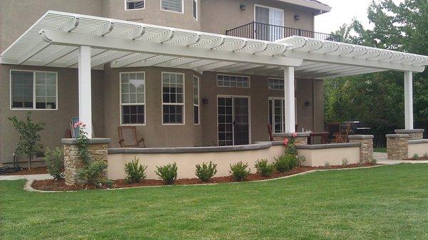 Open lattice patio cover provides shade and light during the summer heat..