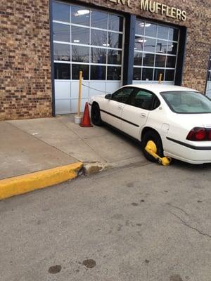 Booted vehicle, now stuck in front of my business, not my car, and not legal to do according to CPD.