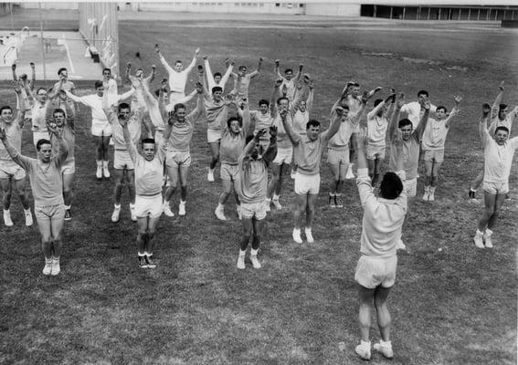 1961, Hoover Junior High School, San Jose: "A class warms up with calisthenics before beginning a game.  San Jose Mercury News