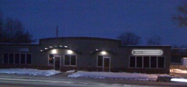 Well Dispensary - Exterior Building at Night (banner in place right now though)