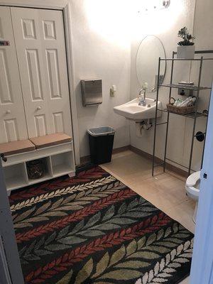 Private bathroom with changing area for clients who come from or go straight to work!