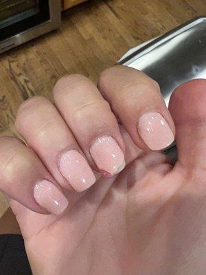 The pink fill from a different nail salon trying to fix their mistake